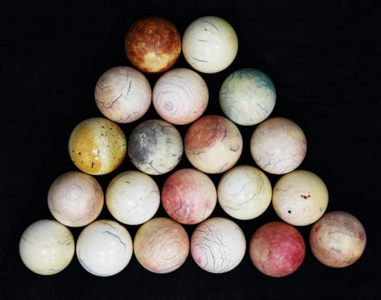 A collection of twenty early 20th century ivory snooker balls, each approx. 2in.